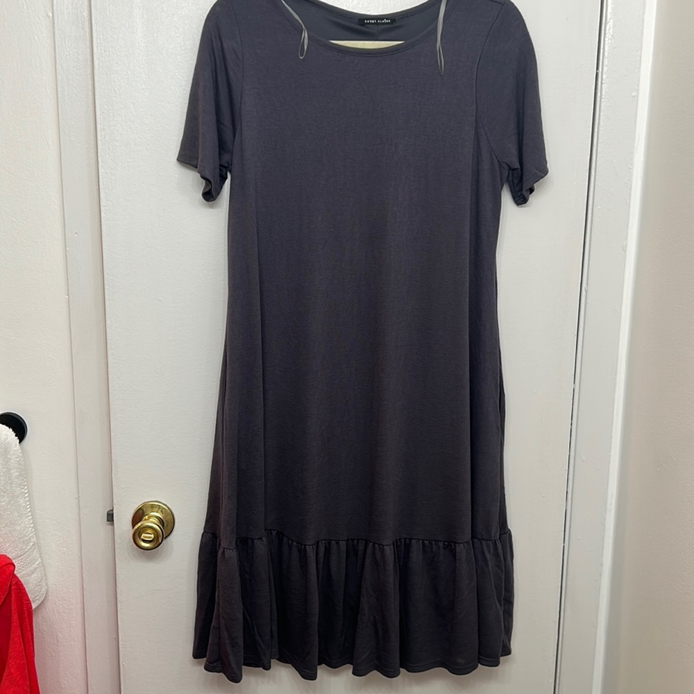Sweet Clair Navy short sleeved Dress with ruffle bottom.